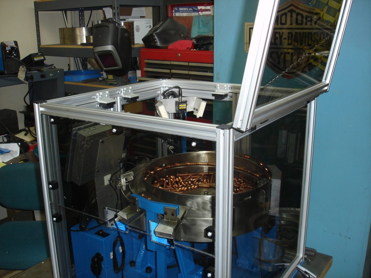 Guarded feeder cell, second view